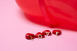 © Johnér - Heart-shaped candies on pink background