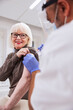 © Johnér - Senior woman getting vaccinated against Covid-19