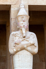 Wall Mural - A sculpture of Pharaoh at the Mortuary temple of Hatshepsut near the Egyptian city of Luxor