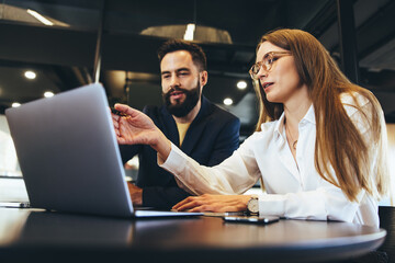 modern entrepreneurs having a discussion in an office