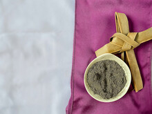 Lent Season,Holy Week And Good Friday Concepts - Image Of Bowl Of Ash With Cross Made Of Palm Leave Background. Stock Photo.