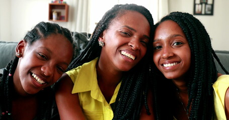 Wall Mural - Mother and teen daughters together. African black ethnicity