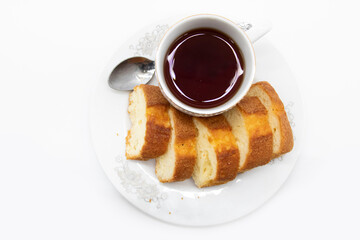 Wall Mural - cake with tea isolate on white background, top view