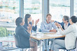 © C S W/peopleimages.com - He made COO. Shot of a group of businesspeople having a meeting in a boardroom.