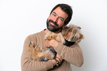 Wall Mural - Man holding a dog isolated on white background