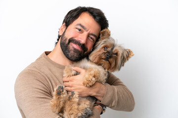 Wall Mural - Man holding a dog isolated on white background