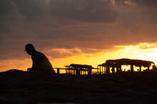 Sunrise Worker Fixing Beach Huts Cuba