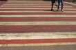 © Tanakon photo  - Pedestrian crossings in the city are people walking across the street.