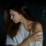 Fototapeta Koty - portrait of a young woman with emotions suffering, depression, pain, fear, loneliness, longing, mental disorders 