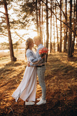 Bride and groom in Ukrainian national clothes. Wedding embroidered clothes. Wedding in the Ukrainian style. Happy bride in traditional Ukrainian embroidered dress. Ukrainian patriots