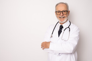 Wall Mural - Smiling medical doctor with stethoscope. Isolated over white background