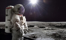 Astronaut On Surface Of Moon. Artemis Lunar Space Program. Moonwalk Of Spaceman. Elements Of This Image Furnished By NASA
