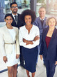 © Anne/peopleimages.com - Teamwork enables smoother movement towards targets. Portrait of a team of corporates standing together in an office.