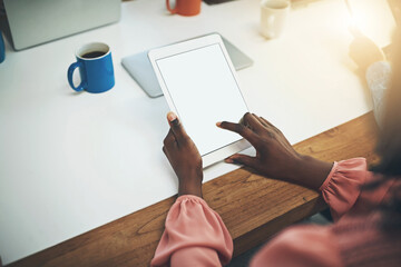 Poster - Getting business done the smart way. Shot of an unrecognisable businesswoman using a digital tablet in an office.