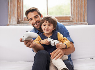 Poster - Hey, thats cheating. A handsome father and his cute son playing a video game together.