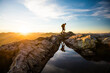 © Cavan Images - Backpacker on the move, hiking over rocky terrain, Canada.