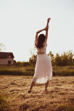Woman Raise Hands In Countryside Summer Background