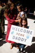 © Cavan Images - Mother & Two Daughters Waiting for Military Homecoming in San Diego