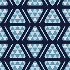 Wall Mural - Blue and gray triangles of different sizes create an ornament on a black background. Seamless geometric pattern for packaging, business. Vector illustration.