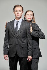 Wall Mural - elegant couple in suits