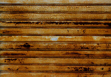 Old Rusty Metal Background. Detail Of A Door With Peeling Color.