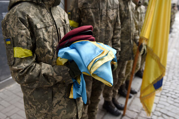 Ukrainian soldiers stand during funerals ceremony. memorial service