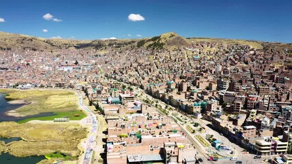 Canvas Print - Aerial view of Puno with Lake Titicaca in Peru, South America