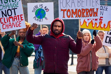 Wall Mural - Group Of Protestors With Placards On Demonstration March Against Climate Chane