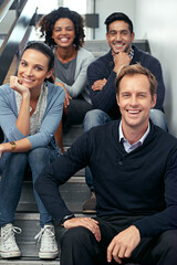 Poster - Taking a rest on the way to the top. Portrait of a group of office coworkers sitting in a stairwell.