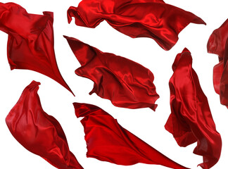 Set with beautiful delicate red silk floating on white background