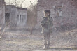 © Jacek - Child and war. Little, poor boy in the ruins of a bombed house.