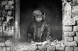 © Jacek - War and the child. Little scared boy in the ruins of the house. Portrait of a poor child, victim of the war.