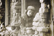 © Jacek - Child and war. Little, poor boy in the ruins of a bombed house.