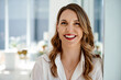 © Mikolette M/peopleimages.com - Always keep a positive mentality. Portrait of an attractive young businesswoman standing inside her office.