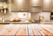 Empty Wooden Table And Blurred Kitchen Background For Display Or Montage Your Products