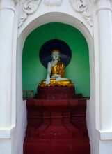 Gold-adorned Buddha Statue In An Alcove In Shwedagon Pagoda In Yangon, Myanmar