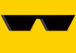 Fondo de cara amarillo con gafas de sol.