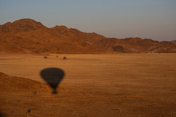 Wall Mural - Shadow of hot air balloon in Namibia