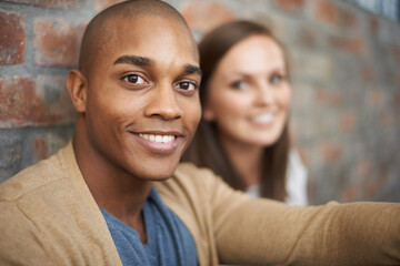 Wall Mural - Hanging out with a friend. Cropped shot of two friends sitting together.