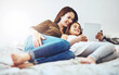 © Nikish Hiraman/peopleimages.com - Finding fun things to do online. Shot of a little girl and her mother using a digital tablet together.
