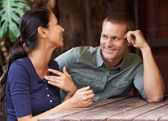 Poster - Man, I love catching up on all the female gossip. A young couple chatting while sitting at a cafe.