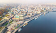 Kyiv cityscape aerial drone view, Dnipro river, downtown and Podol historical district skyline from above, city of Kiev and Dnieper, Ukraine