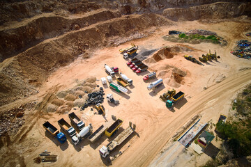 Aerial view of parked trucks and machineries