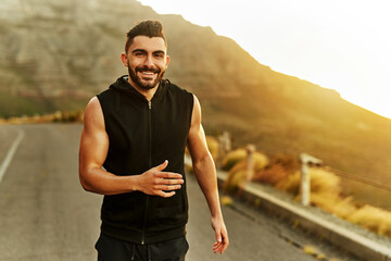 Poster - There is something about running that makes me so happy. Shot of a young man exercising outdoors.