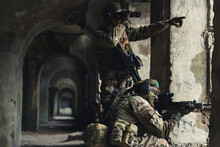 Pointing Towards Enemy Position Coordinates As A Team. High Quality Photo