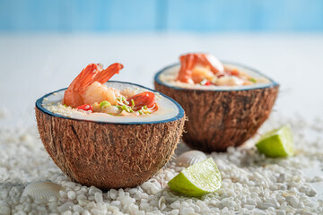 Wall Mural - Spicy Tom Yum soup with coconut milk and shrimps.