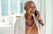 © Mikolette Moller/peopleimages.com - Sounds like shes making success happen yet again. Shot of a young businesswoman talking on a cellphone in an office.
