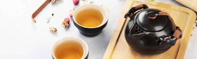 Canvas Print - Asian tea set on light background.