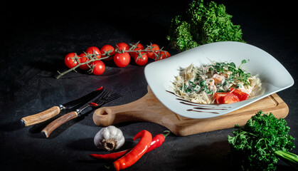 Wall Mural - Italian home made pasta with smoked salmon, creamy sauce on dark background