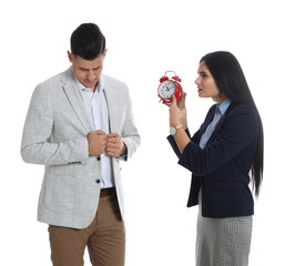 Poster - Businesswoman with alarm clock scolding employee for being late on white background